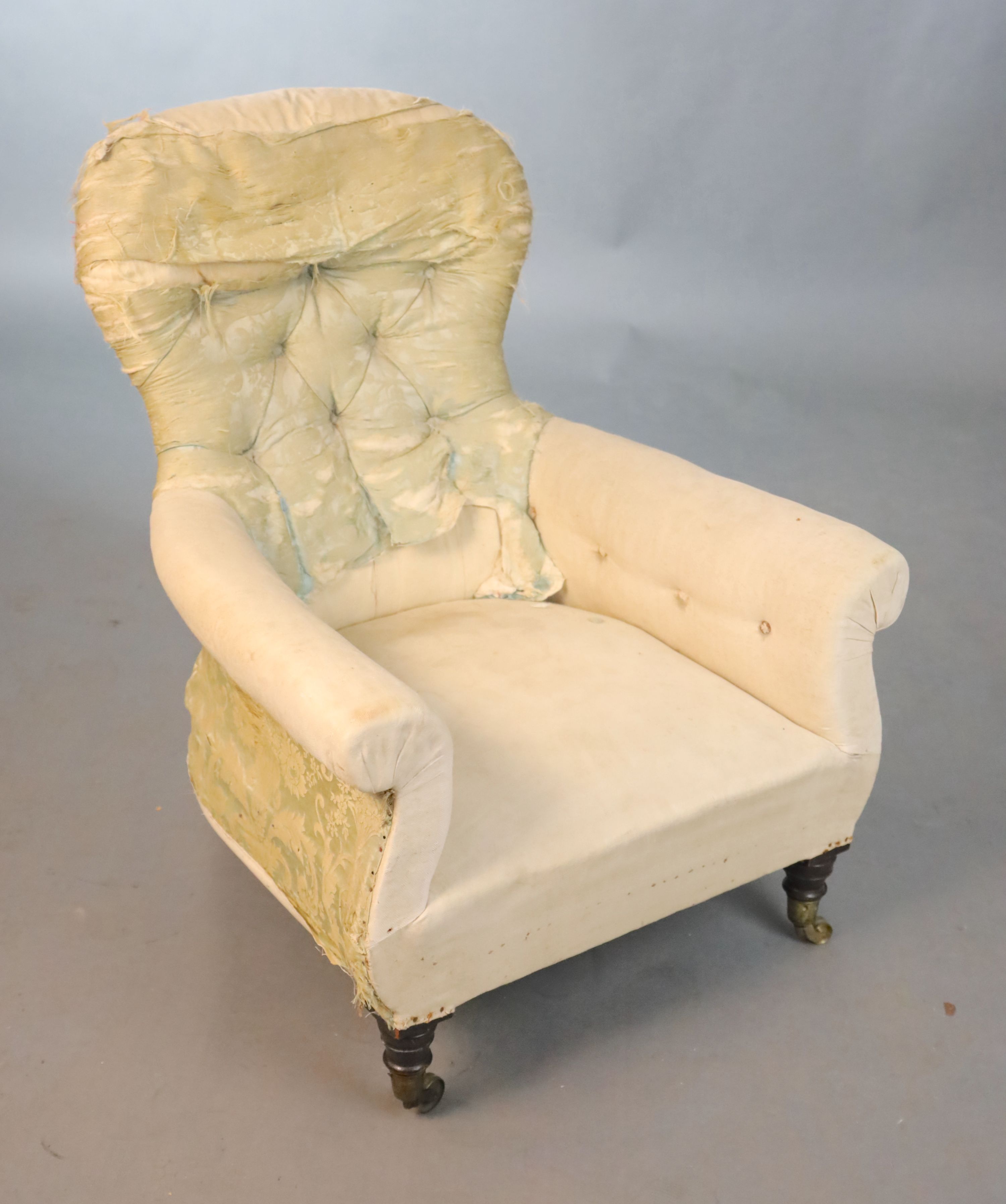 An early Victorian ebonised oak deep seated button back armchair, W.74cm D.86.5cm H.91.5cm